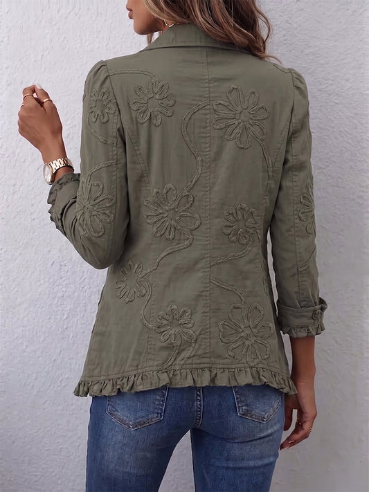 Espalda de la chaqueta Ascensión con el bordado floral y el volante en el bajo