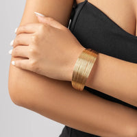 Brazalete Trenzado Ancho Tono Oro - Nora