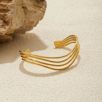 Brazalete Multicapa Calado Tono Oro - Aitana