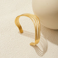Brazalete Multicapa Calado Tono Oro - Aitana