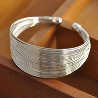 Brazalete Trenzado Ancho Tono Oro - Nora