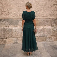 Vestido Leonor en verde oscuro, de espaldas